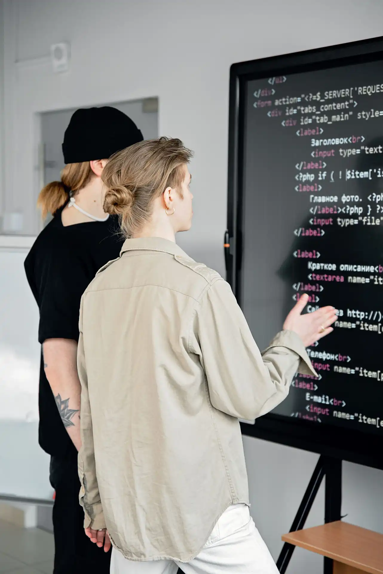 College team reviewing campus operations software on screen