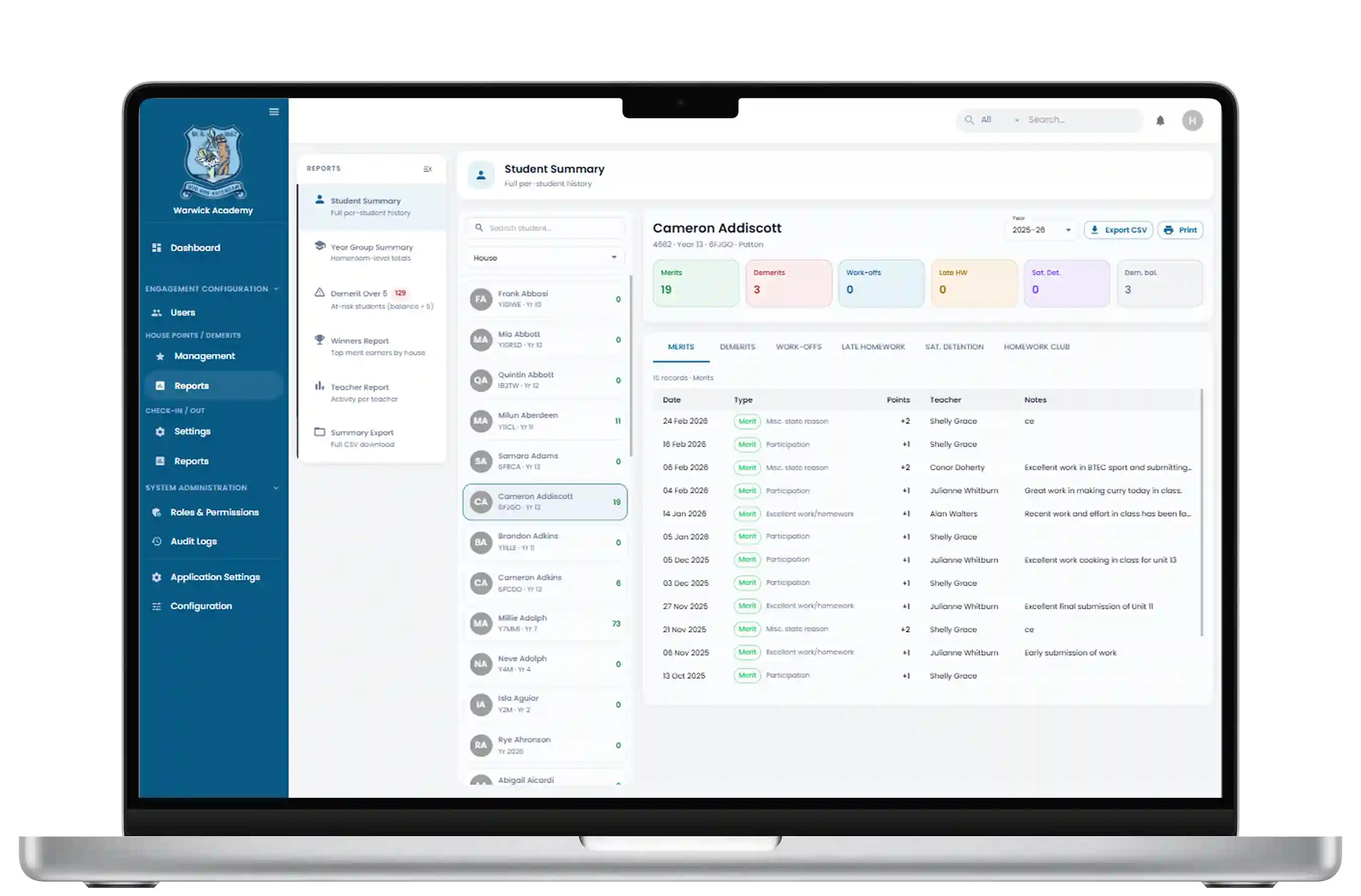 Warwick Academy school management platform on a laptop dashboard