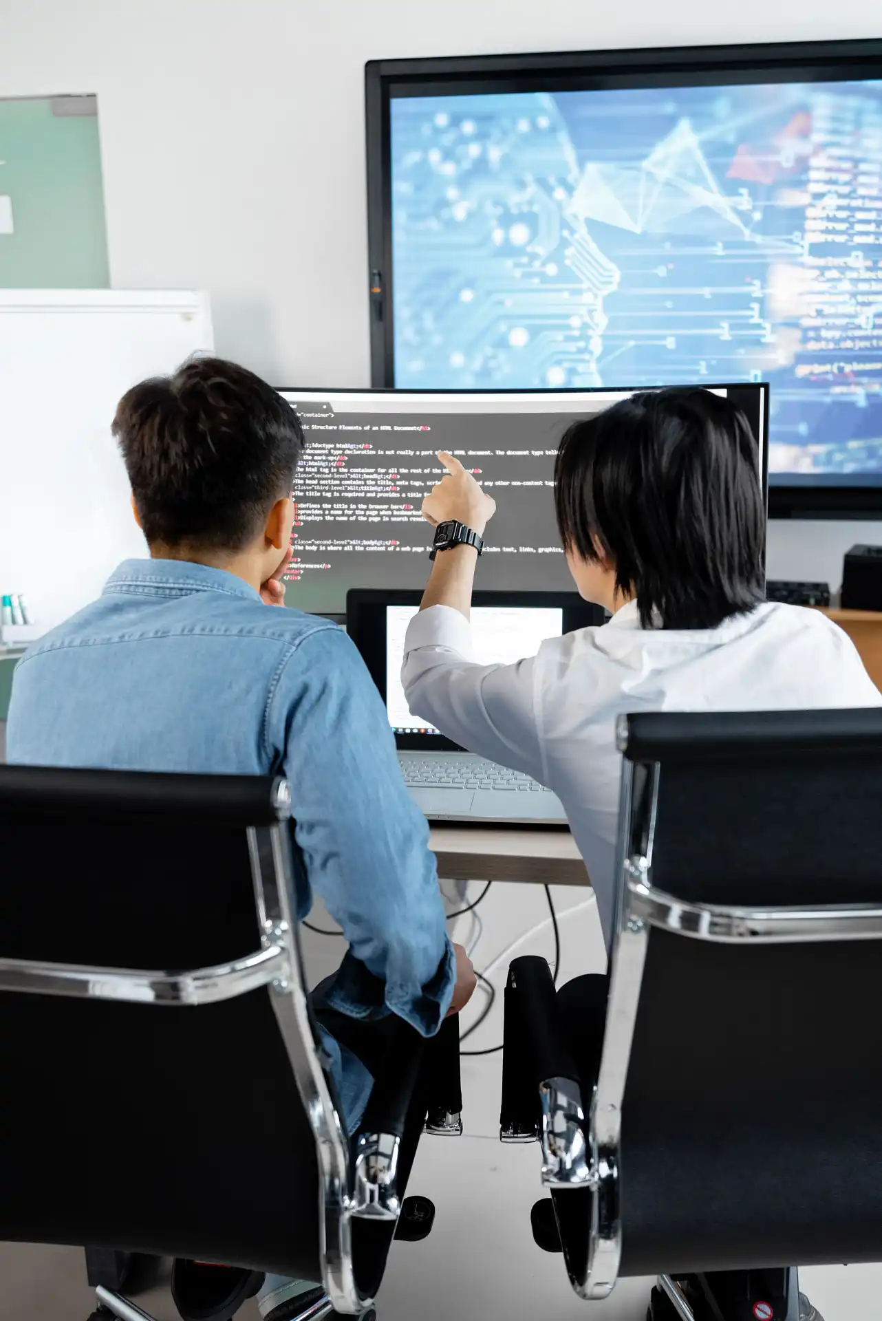 Educators collaborating on K-12 school management software